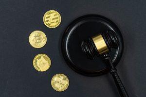 Cryptocurrency coins in front of a market chart